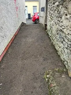 Belleview Avenue lane after clean-up, view 1